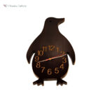 Medium wooden penguin-shaped wall clock, handcrafted solid acacia wood analog wall watch for home and living room décor.
